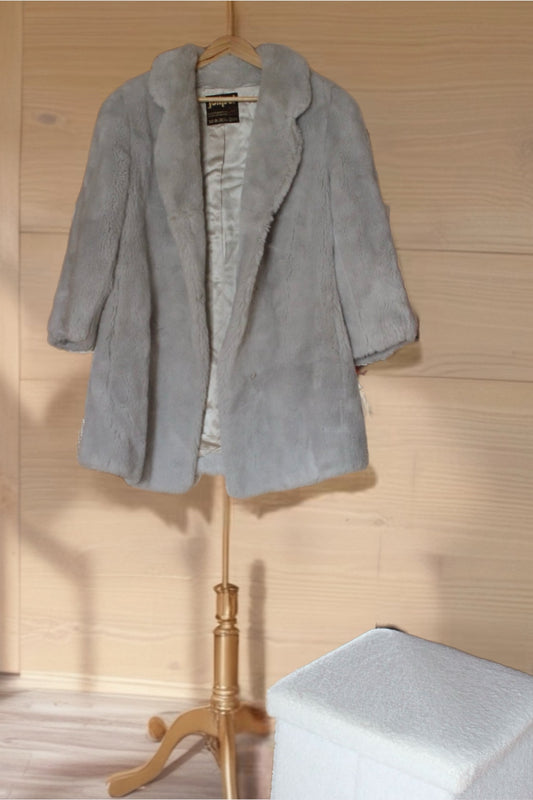Manteau en fausse fourrure